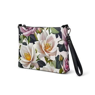 Bed of Roses crossbody bag with cream flowers, purple roses and black trim; wristlet view shown alone.