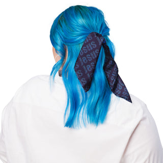 Jesus Microtype bandana tied over hair, rear view.
