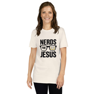 A woman modeling a cream-colored t-shirt with a black graphic that reads 'NERDS FOR JESUS' with glasses and an open book illustration, set against a plain white background.