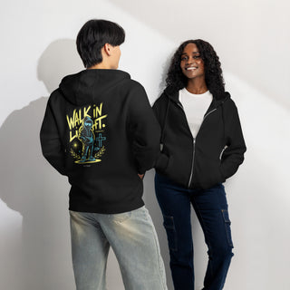 A man and a woman; Two models wearing black hoodies in a studio setting. The model on the left shows the back of a black hoodie with a colorful graphic that reads 'WALK IN LIGHT.