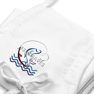 Jesus Saves embroidered apron with waves and a small boat design; white embroidery close-up.