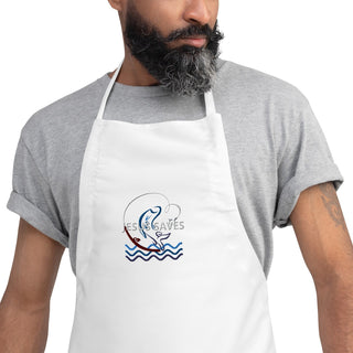 Jesus Saves embroidered apron with waves and a small boat design; white, chest close-up on a bearded model.