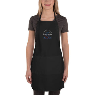 Jesus Saves embroidered apron with waves and a small boat design; black, full front on a model.