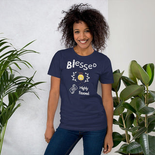 Navy T-shirt with Blessed and Highly Favored lettering with a smiling sun, modeled beside plants