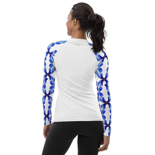 Back view of a white rash guard on a model, with blue butterfly sleeves and an unprinted back