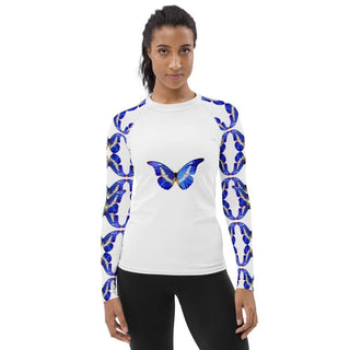 White long-sleeve rash guard with blue butterflies on the chest and sleeves, modeled, front view