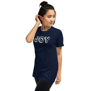 Navy T-shirt with outlined JOY bubble lettering, modeled with a hand near the ear