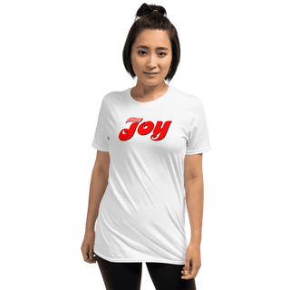 White T-shirt with red Joy script, modeled by a woman with tied-up hair