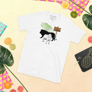 White T-shirt with The King Is Coming lion, lamb and palm design, laid flat among fruit and gift decorations